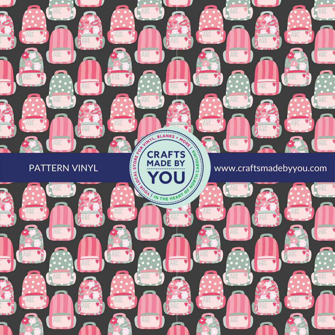 12" x 12" Pattern Adhesive Vinyl- Pink Backpacks on Black Background